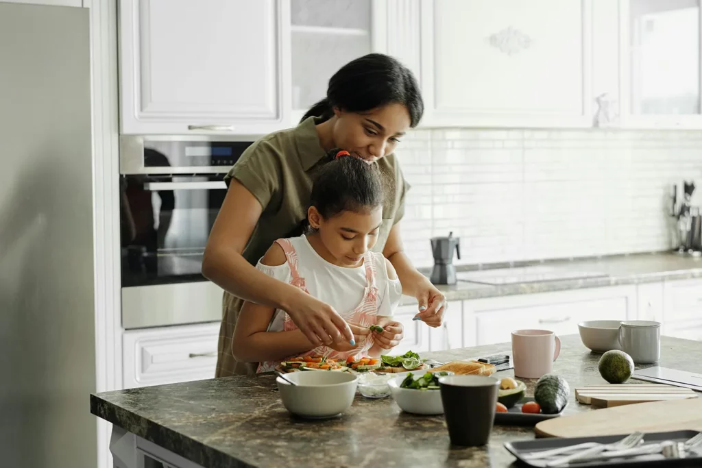 Mom and child preparing a healthy meal